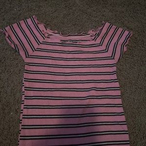 pink white and black ruffle shirt